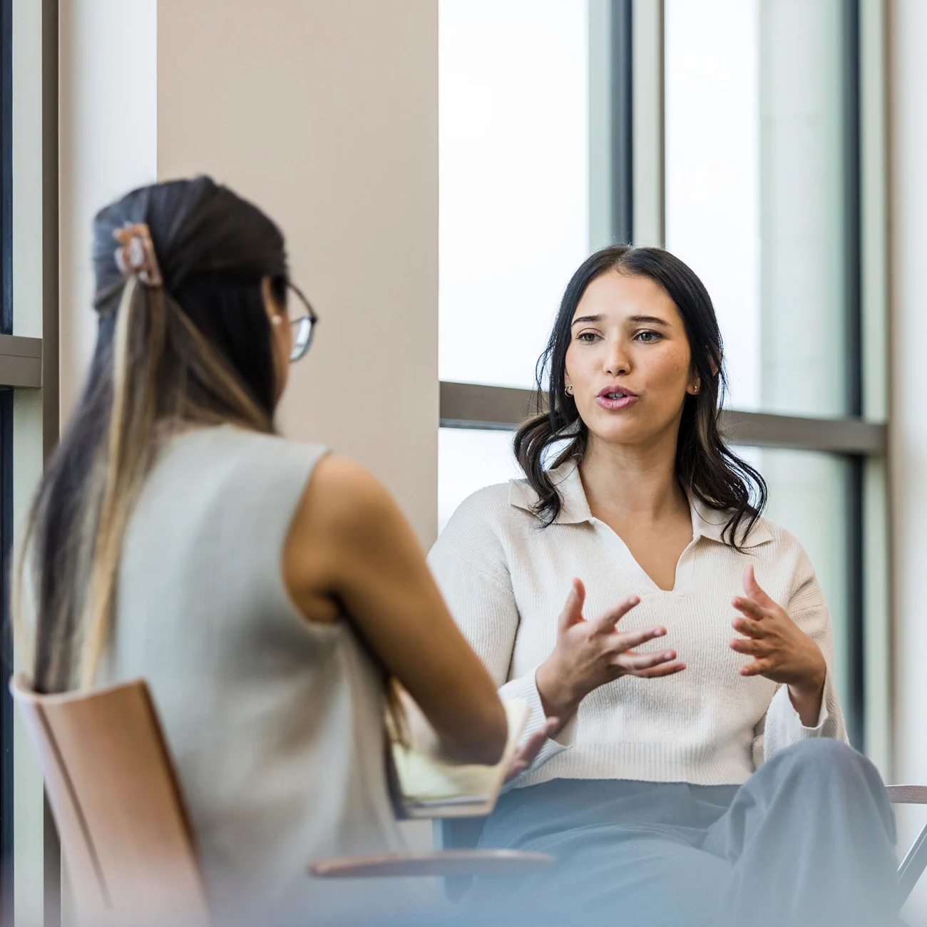 Two people in discussion